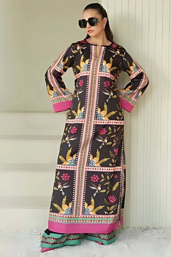 Woman wearing a colorful traditional outfit with floral patterns against a white background